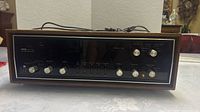 Front view of Simpsons-Sears LTD stereo receiver wood case