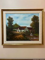 Front view of framed oil painting showing entire artwork and frame