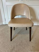 front view of beige leather chair