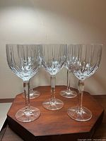 Group of five Marquis by Waterford crystal wine glasses standing upright