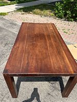 Full view of rectangular solid wood table