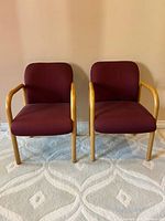 Front view of both matching armchairs