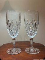 Both Waterford Marquis crystal glasses upright showing full shape and matching design