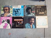 All eight LPs laid out showing front covers