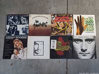 All eight LP jackets laid out for identification