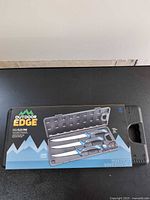 Retail box front showing Outdoor Edge ReelFlex Pak