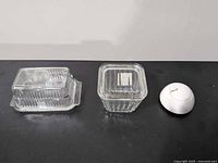 All three containers with lids displayed side by side