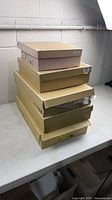 Stack of Michael Kors shoeboxes