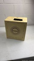 Beige Kodak cardboard box with carry handle