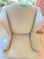 Top view of wingback armchair showing upholstery texture and wings