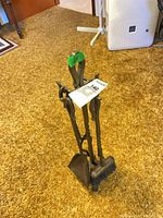 Full view of fireplace tool set on stand