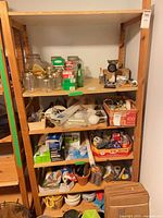 Full view of wooden shelving unit with contents present (contents not included)