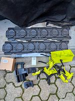 Full lot showing rails, hooks, bin, battery mounts, magnetic bar, hardware box
