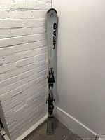 Full view of pair of HEAD Cyber C160 skis standing upright