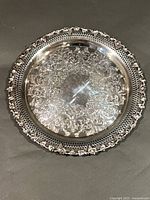Front view of ornate silver tray
