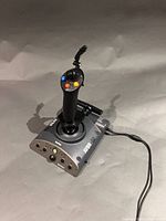 Full view of Saitek AV8R-02 joystick with attached USB cable
