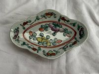 Top view showing floral decoration and scalloped edge