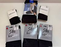 Front view of all three retail packs: DKNY tights, Silks tights, Nicole Miller leggings