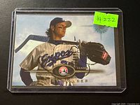 Front of autographed Larry Walker Expos card in plastic holder