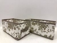 Two rectangular floral fabric bins side by side