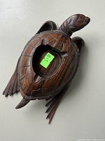 top view showing hollowed shell cavity and carved details