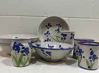 Group view of all seven Blue Iris pottery pieces