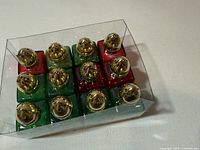 Top view of 12 miniature shakers in box