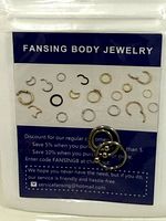 Front view of sealed Fansing Body Jewelry package holding three stainless steel captive rings