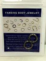 Front of sealed FANSING package showing rings and branded insert
