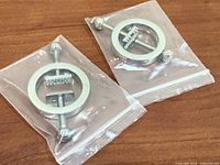 Both clamp fittings in sealed plastic bags