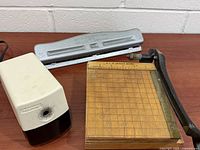Boston sharpener, Mutual punch, R.L.H. trimmer board grouped on table