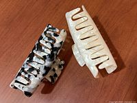 Top view of both hair claw clips showing patterns and size