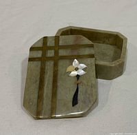 Lid removed showing interior and inlay details