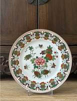 Full view of round Chinese porcelain plate with multicolour decoration