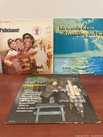 Front covers of all three LPs