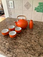 Full tea set arranged on counter