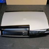 Top and front view of Bose AV18 media center