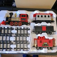 Overall view of train set components in plastic tray