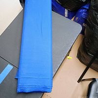 Top view of folded blue fabric bolt