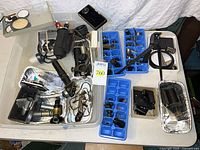 Main tub with assorted microscope parts, illuminator housing, trays