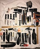 Full layout of all knives, tomahawks, sheaths and accessories
