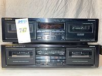Front view of both Onkyo cassette decks showing model numbers and dual-well layout