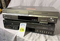 Front view of both combo players stacked