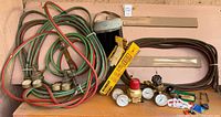 Overall lot showing hoses, regulators, face shield, small parts