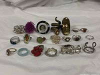 All twenty rings arranged in rows