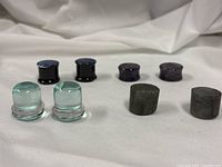 All four pairs of ear plugs arranged in two rows