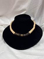 Full view of necklace on display bust