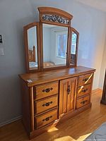 Full view of dresser with attached mirror