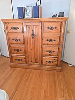 Front view showing all drawers and center cabinet closed