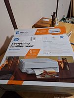 Front of sealed HP Envy 6052e printer box